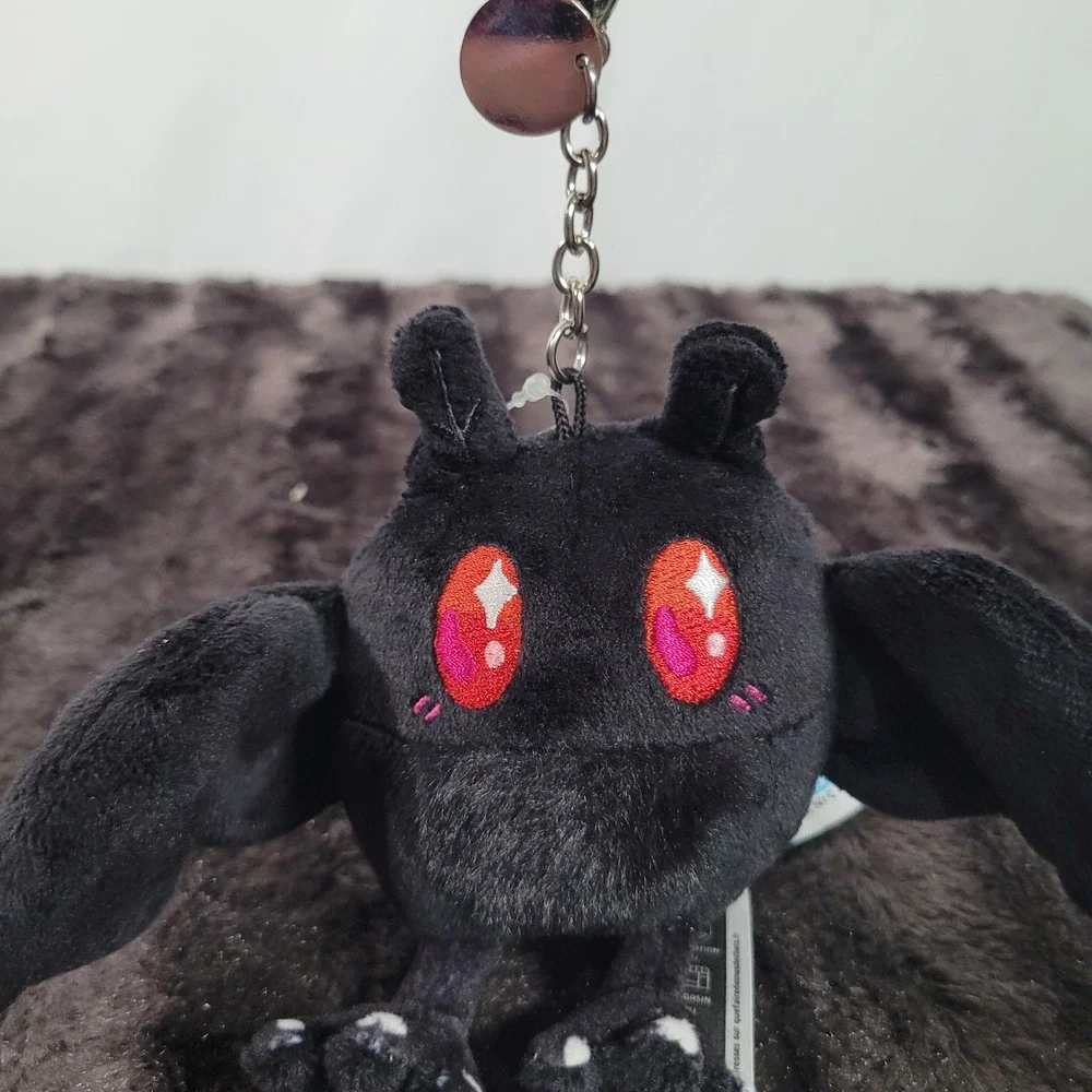 Squishable micro mothman